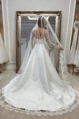 Enchanting Long A-line White Satin Wedding Dress with Long Sleeves and Split