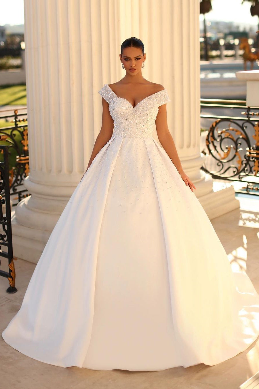 Enchanting Long White Off-the-shoulder A-line Sequined Bridal Dress with Pearl Details