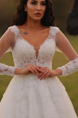 Designer Long A-line V-neck White Lacy Wedding Gown with Elegant Long Sleeves