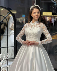 Charming Floor-Length Crew Neck Long Sleeves A-Line Satin Wedding Dress with Ruffles