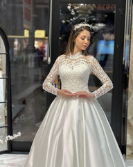 Charming Floor-Length Crew Neck Long Sleeves A-Line Satin Wedding Dress with Ruffles