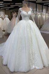 Gorgeous Jewel Longsleeves Lace Wedding Dresses A-line Tulle Ruffles Bridal Gowns With Appliques Online